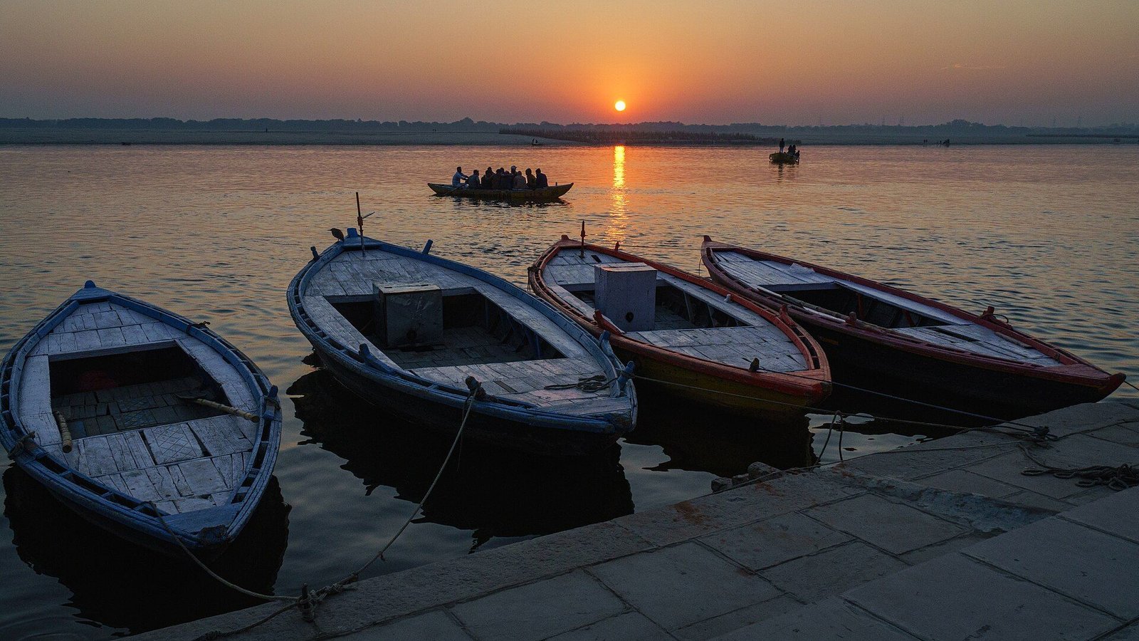 Boats on the Ganges at sunrise in Varanasi